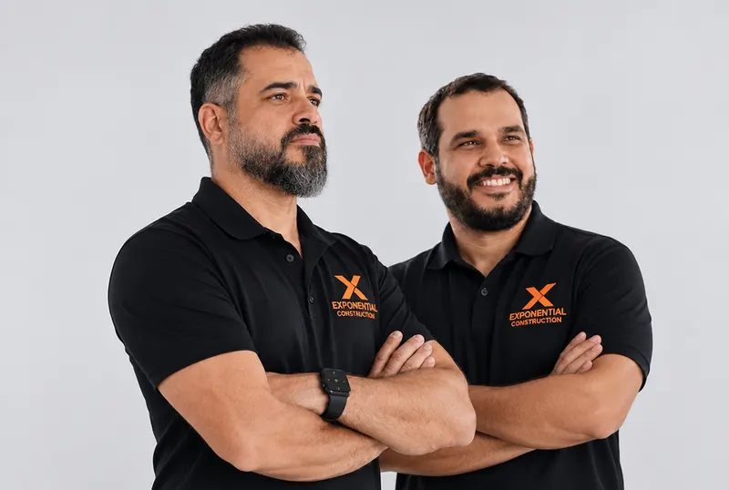 Jeferson and Bruno Andrade, the brothers behind Exponential Construction, in company polo shirts